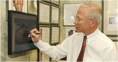 Dr. Robert Martin viewing an X-ray image